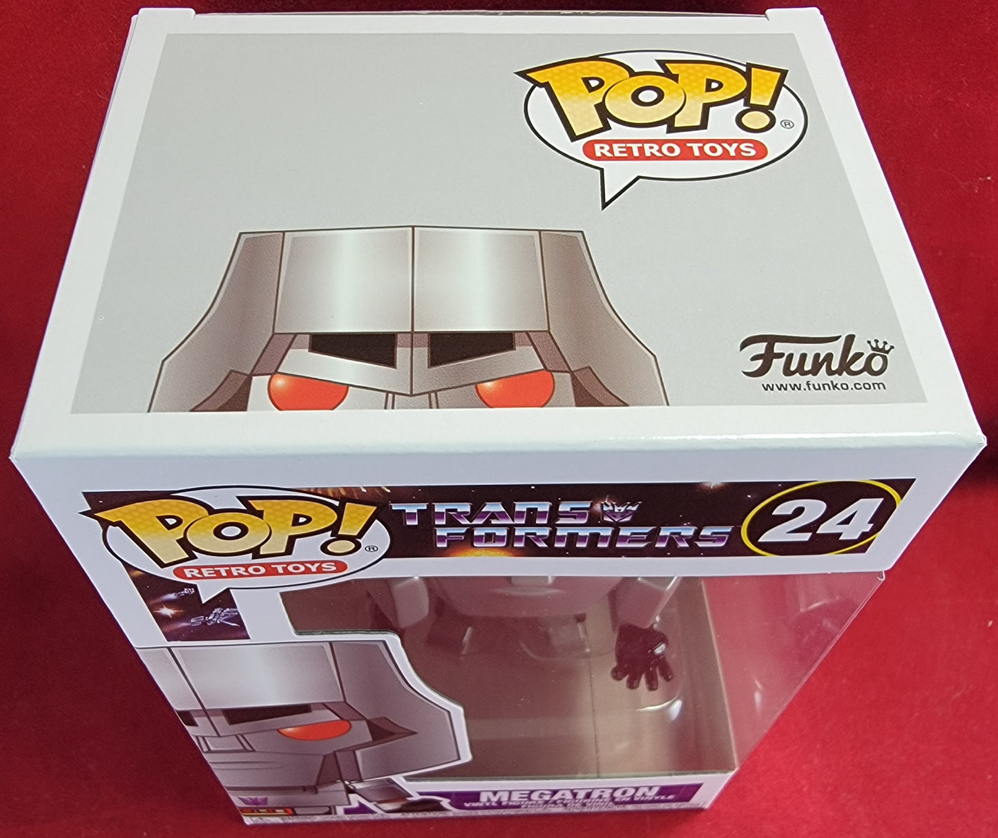 Megatron funko # 24 (nib)
With pop protector