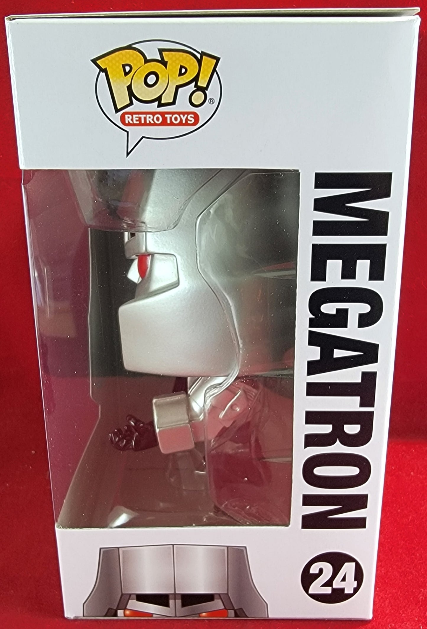 Megatron funko # 24 (nib)
With pop protector