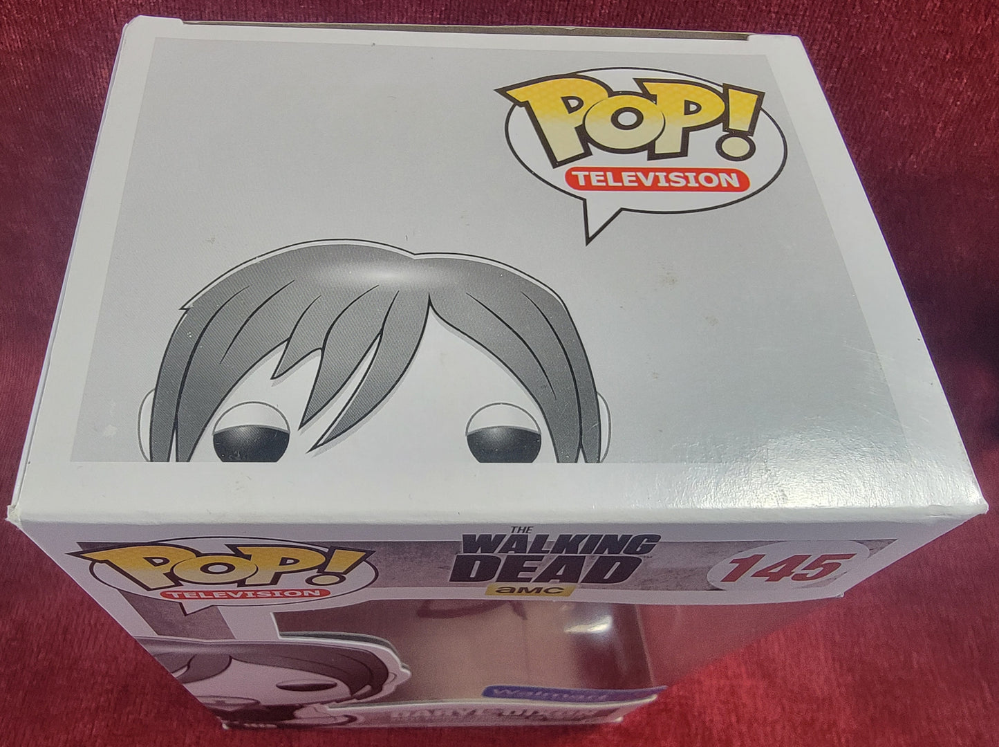Daryl Dixon Wal-Mart exclusive funko # 145 (nib)
With pop protector