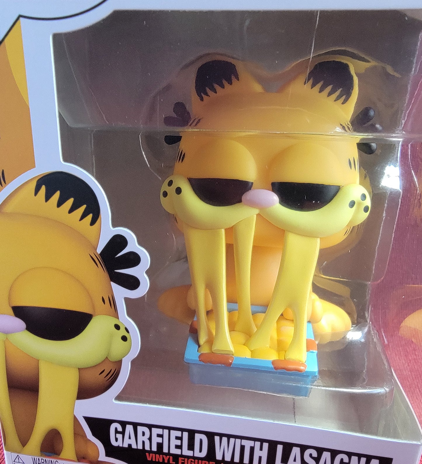 Garfield with lasagna funko # 39 (nib)
With pop protector