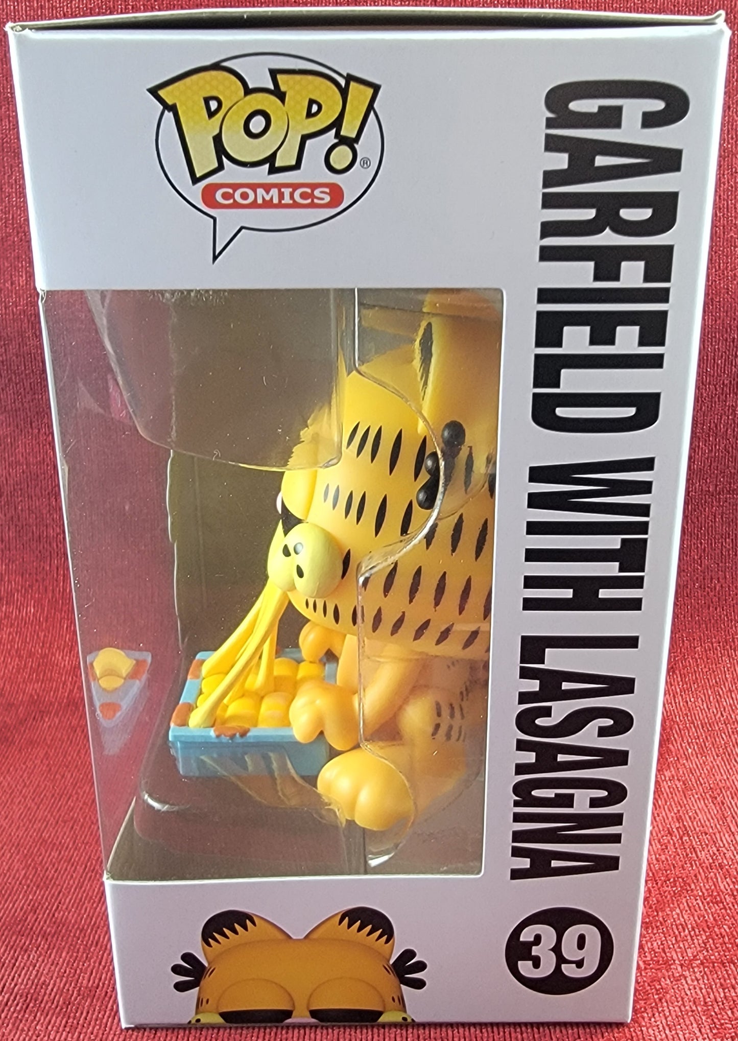 Garfield with lasagna funko # 39 (nib)
With pop protector