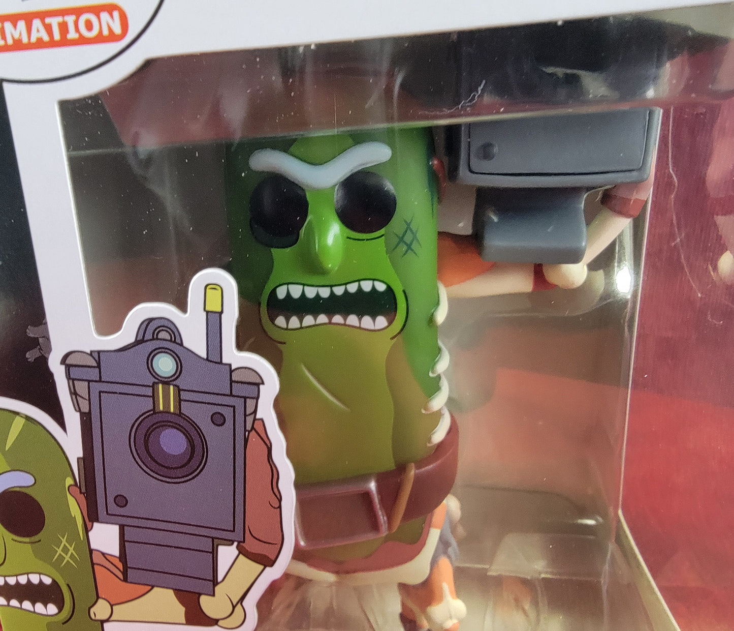 Pickle rick with laser funko # 332 (nib)
With pop protector