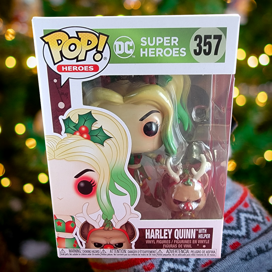 Harley quinn with helper funko # 357 (nib)
With pop protector