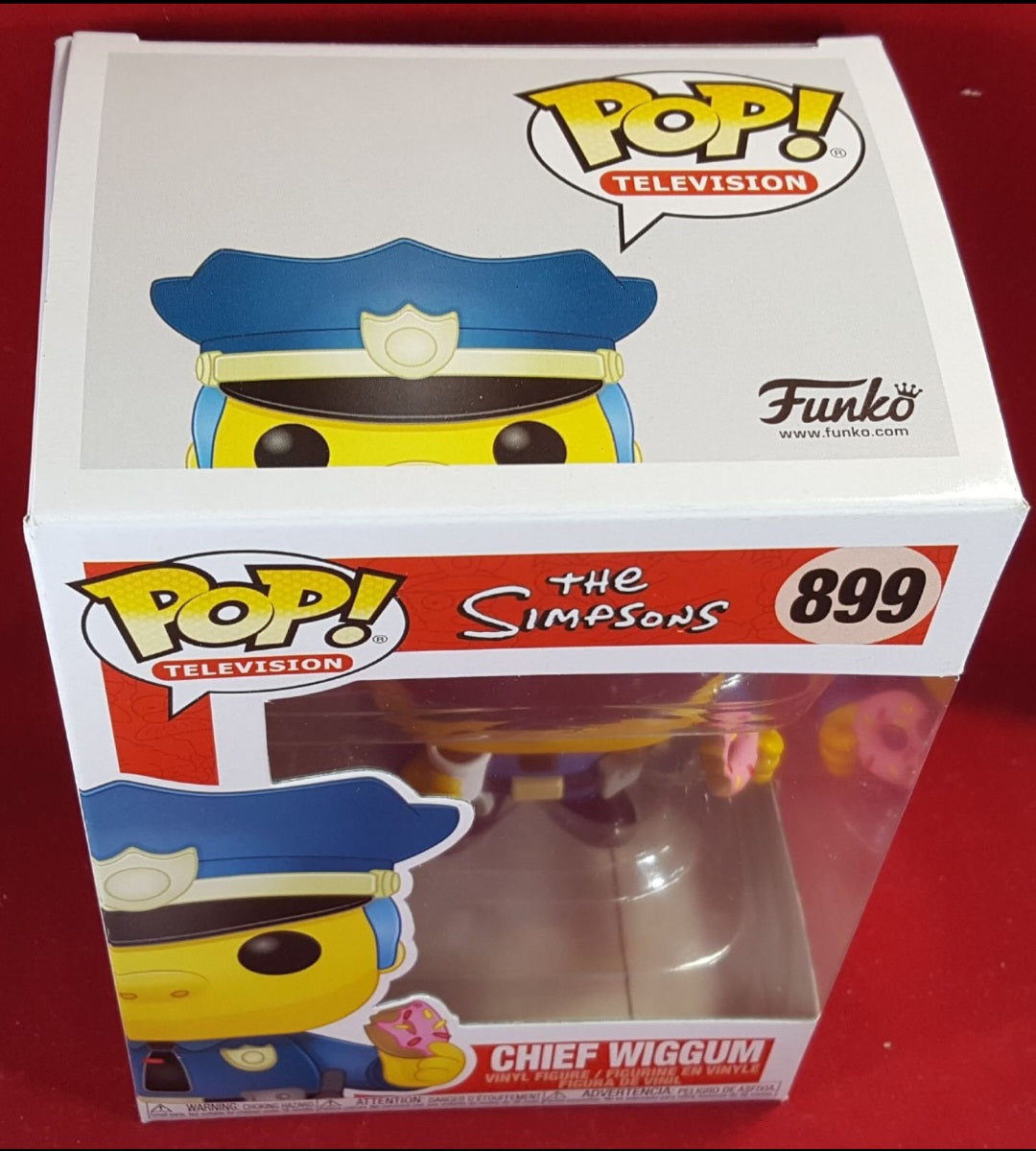 chief wiggum funko # 899 (nib)
With pop protector