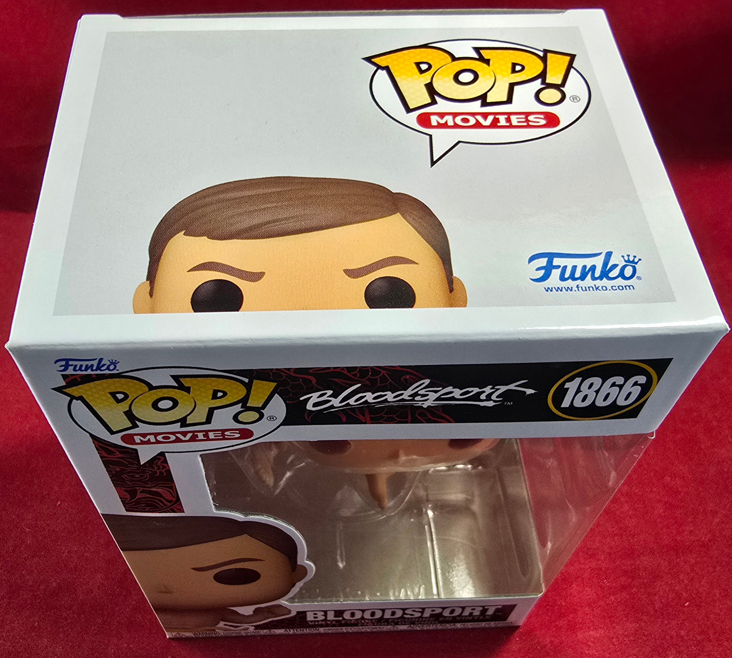 Bloodsport funko # 1866 (nib)
With pop protector