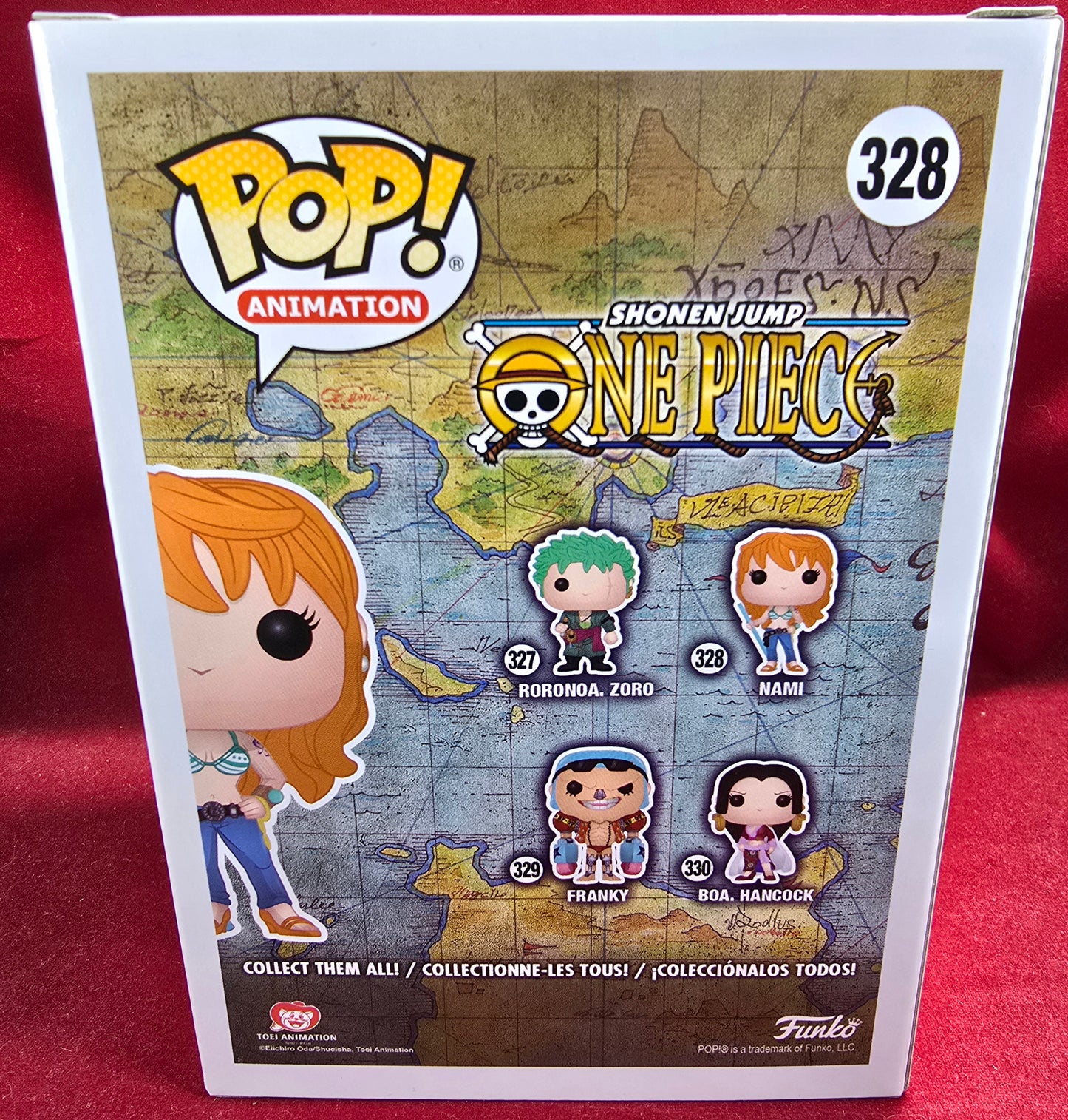 Nami Funko # 328 (Nib)
With pop protector
