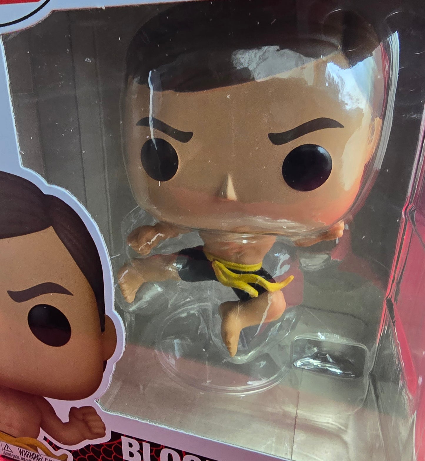 Bloodsport funko # 1866 (nib)
With pop protector