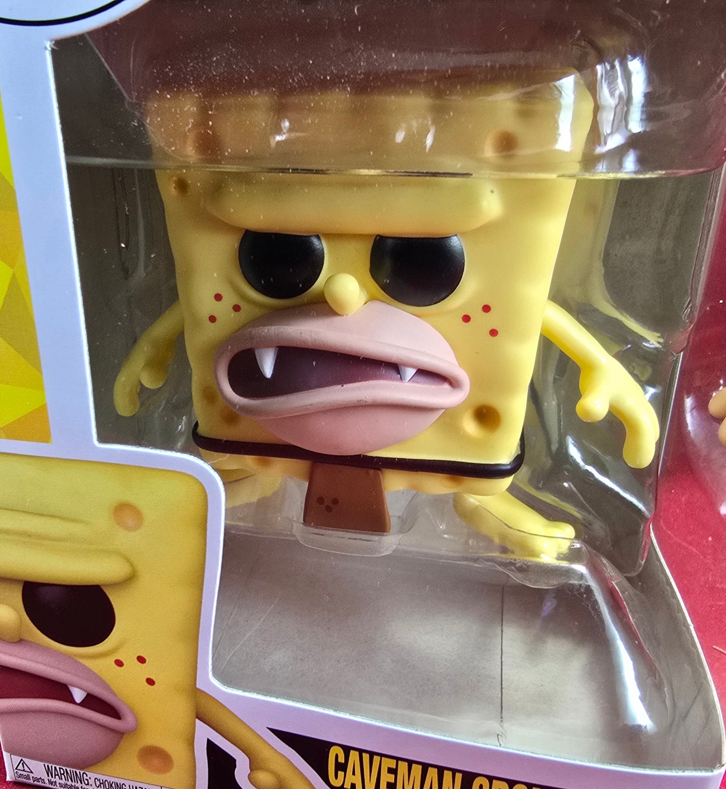 Caveman SpongeBob funko # 1669 (nib) With pop protector