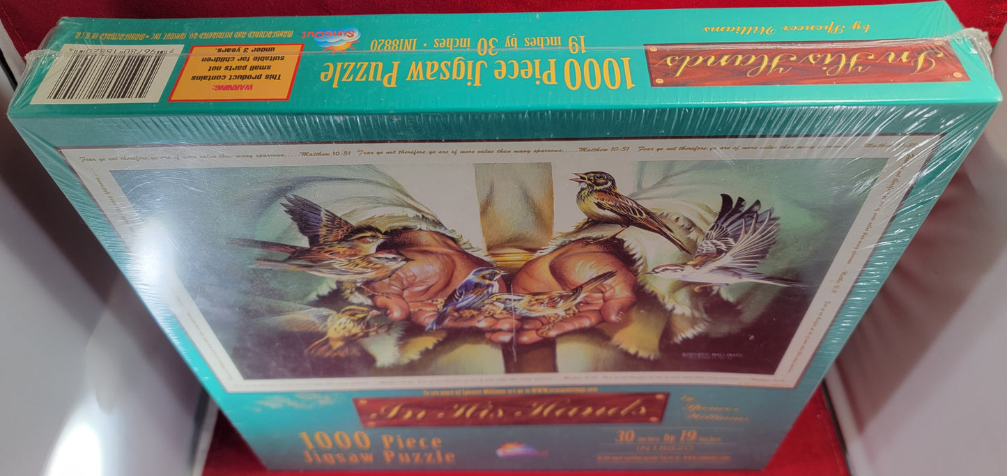 In his hands, 1000 piece jigsaw puzzle (nib)
brand new 30 inches by 19 inches puzzle. puzzle depicts Jesus with his hands out feeding the birds . the item is new and sealed.