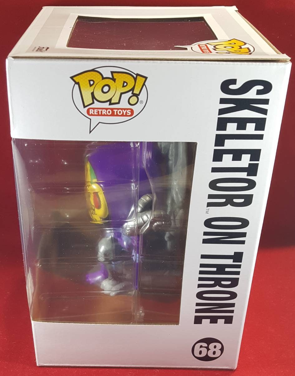 Skeletor on throne # 68 (nib) pop protector included