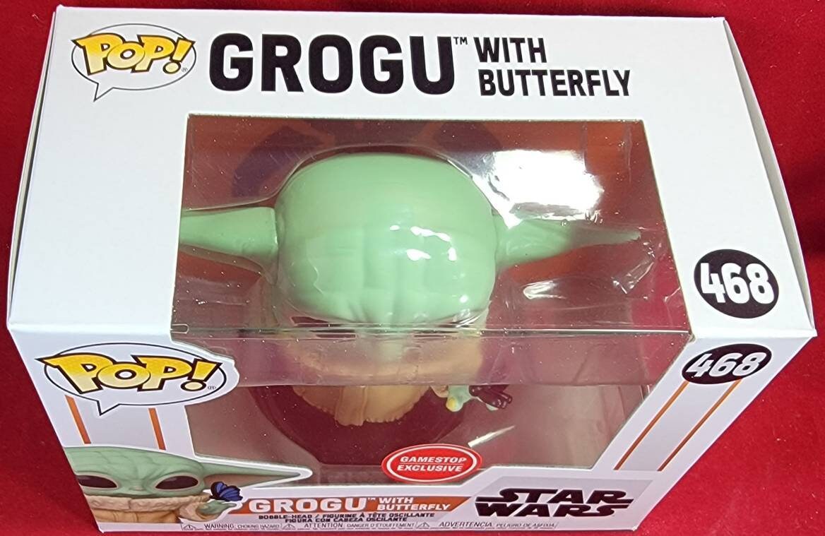Grogu with butterfly gamestop exclusive funko # 468 (nib)