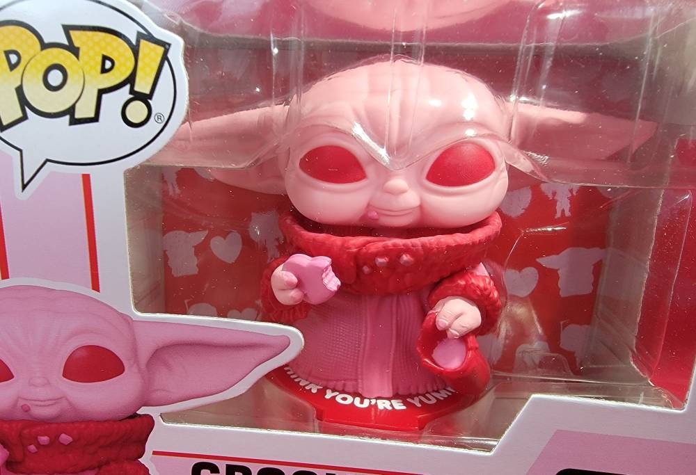 The grogu Mandalorian Funko # 493 Star Wars Pop