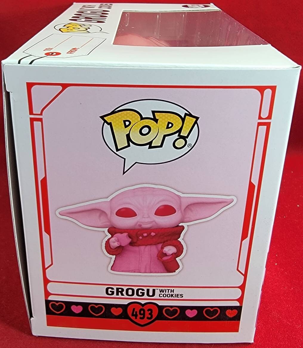 The grogu Mandalorian Funko # 493 Star Wars Pop