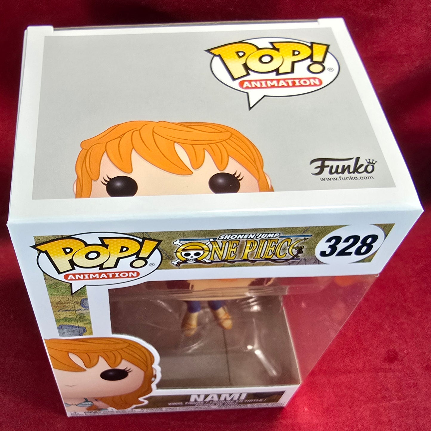 Nami Funko # 328 (Nib) 
With pop protector