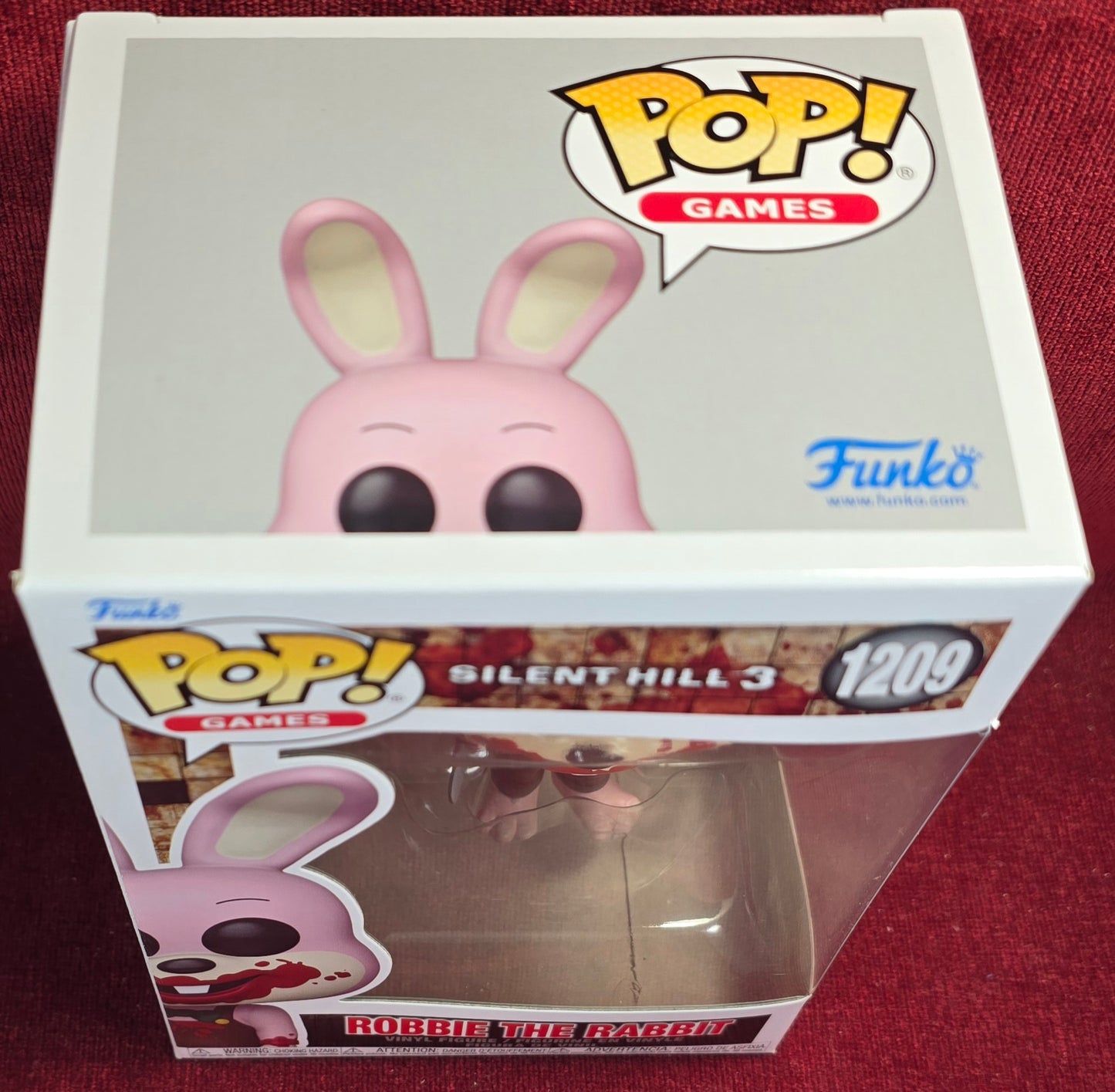 Funko Pop! Games: Robbie the Rabbit # 1209 (Nib)
With pop protector