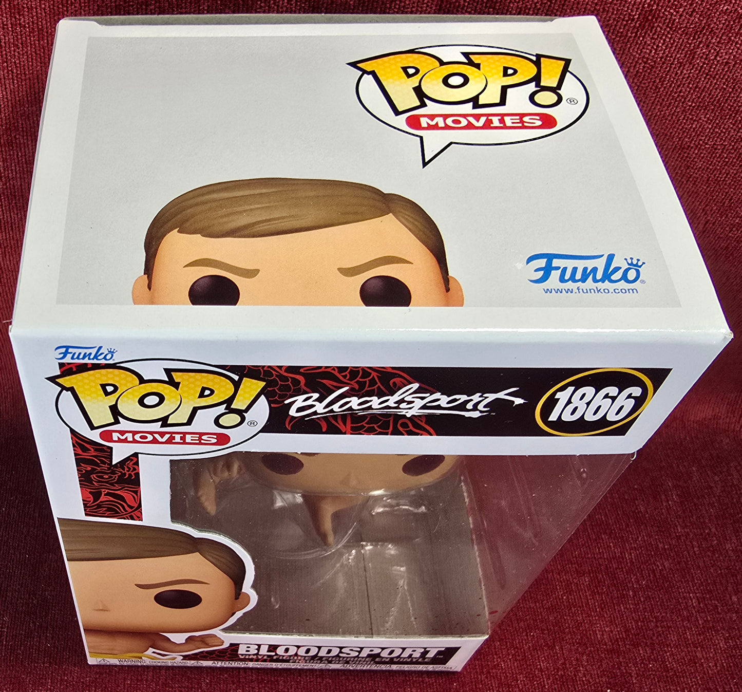 Bloodsport funko # 1866 (nib)
With pop protector
