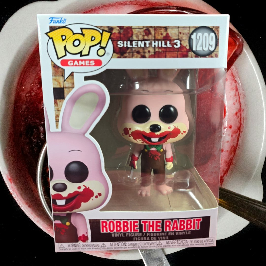 Funko Pop! Games: Robbie the Rabbit # 1209 (Nib)
With pop protector