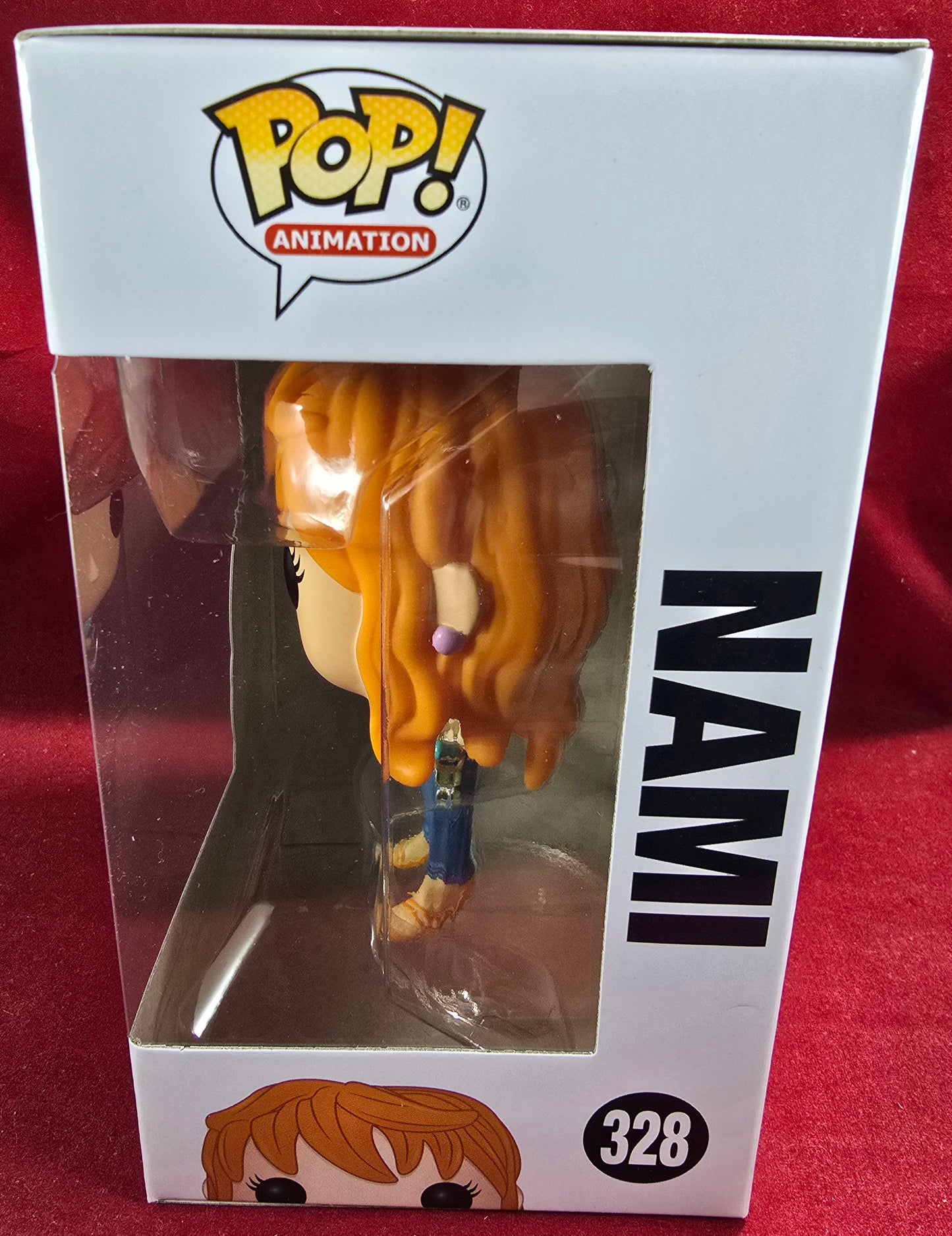 Nami Funko # 328 (Nib) 
With pop protector