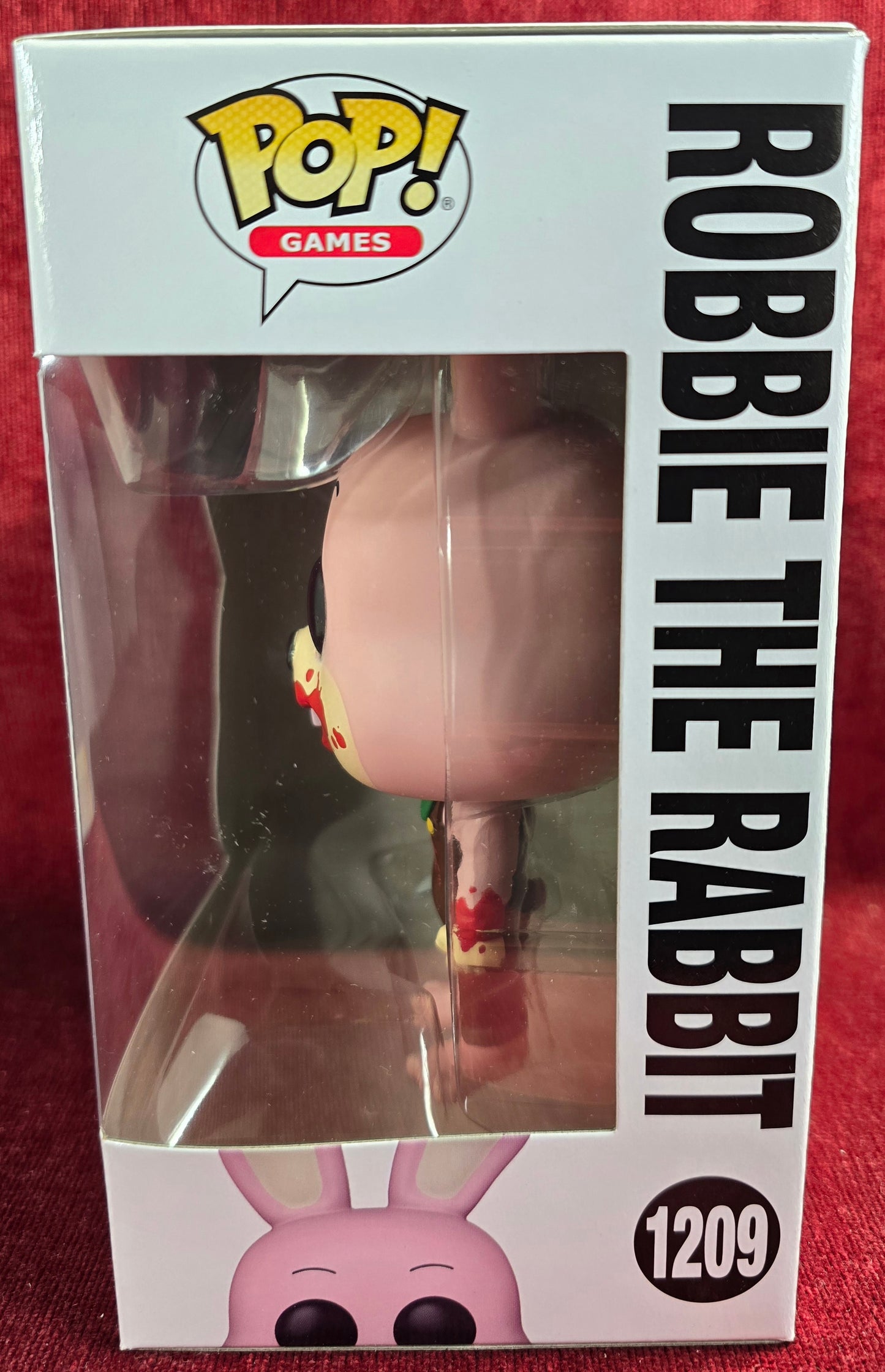Funko Pop! Games: Robbie the Rabbit # 1209 (Nib)
With pop protector
