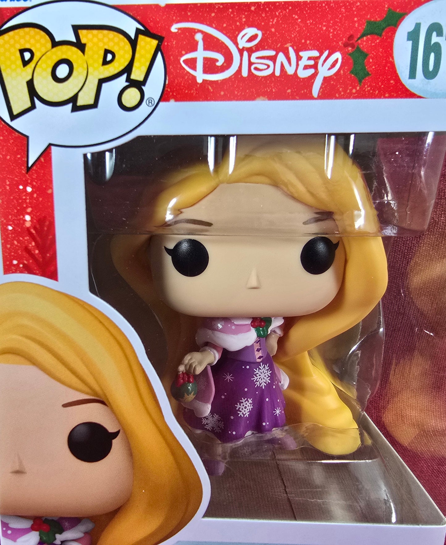 Funko Pop! Vinyl:  Rapunzel #1613 (Nib)
With pop protector
