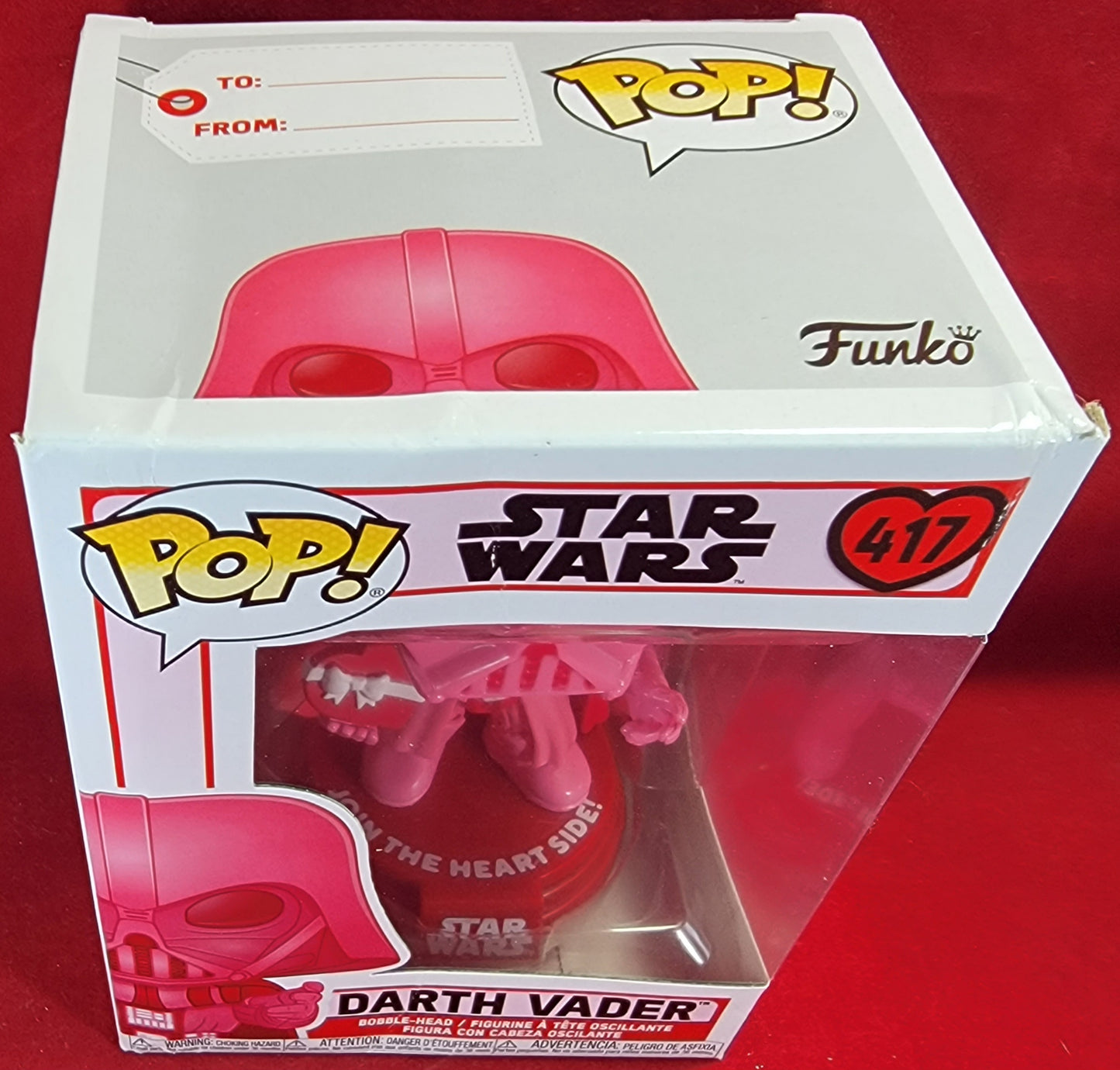 Darth Vader Valentine's Funko # 417 Star Wars (nib)
Darth vader with a box of chocolates and the words "join the heart side  !"  Box has some damage so please refer to pictures.  Pop will be Shipped in a compatible pop protector.
