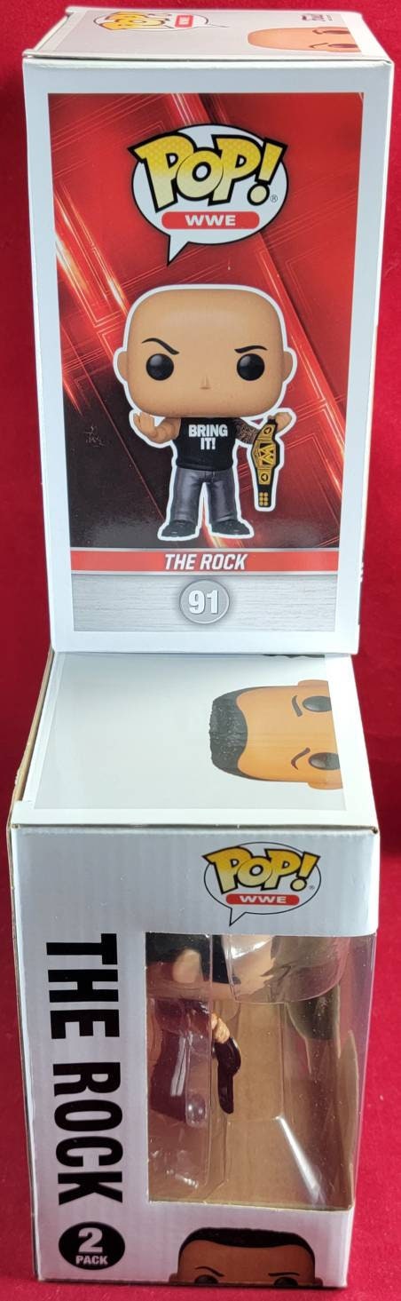 A rock funko set with A mankind funko exclusive (nib)